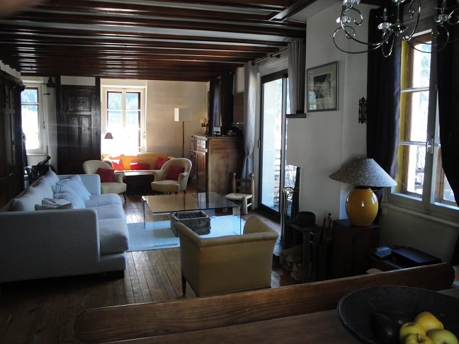 Apartment Lutetia, Chamonix - picture of living room with oak floors and dark wooden beams | Beds n Board | Seasonal Accommodation Chamonix
